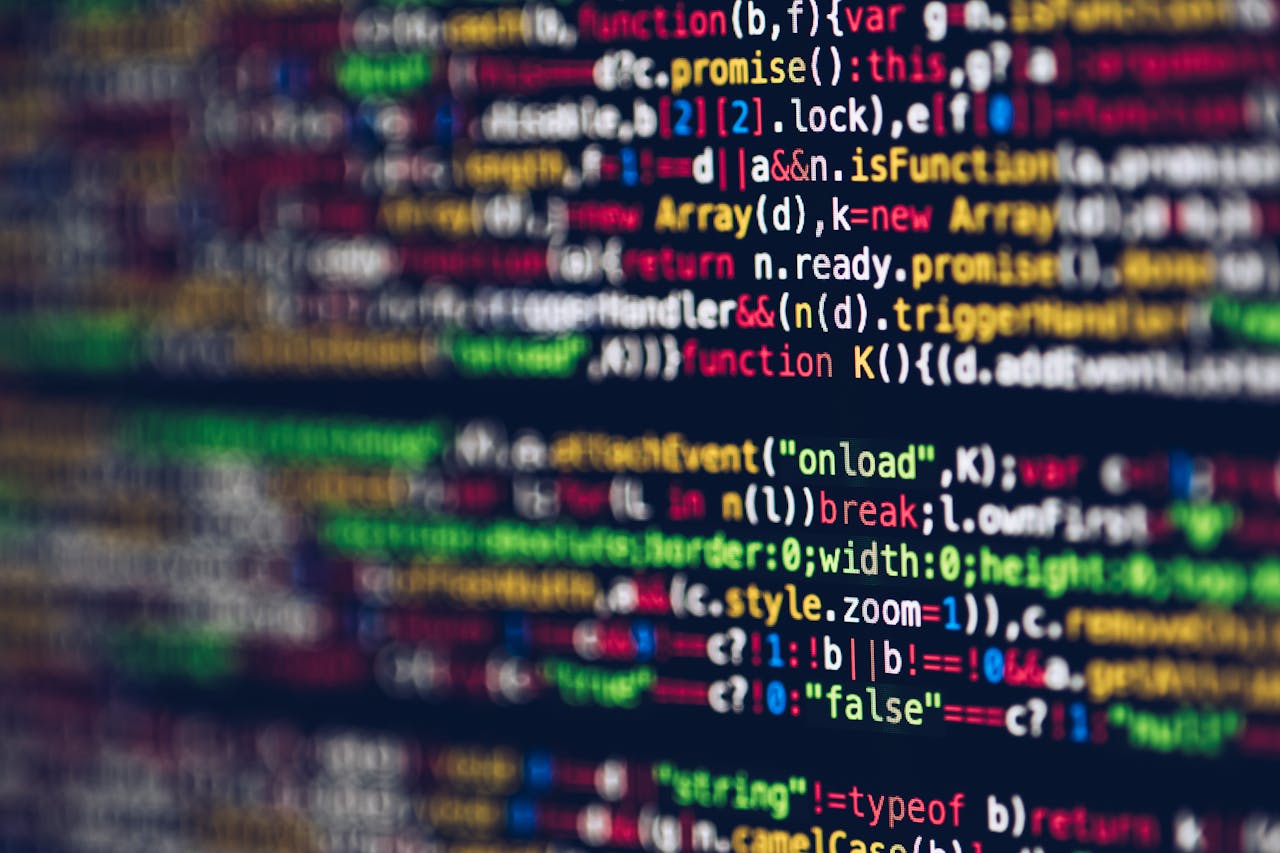 Crafting Captivating Headlines: Your awesome post title goes here Vivid, blurred close-up of colorful code on a screen, representing web development and programming.